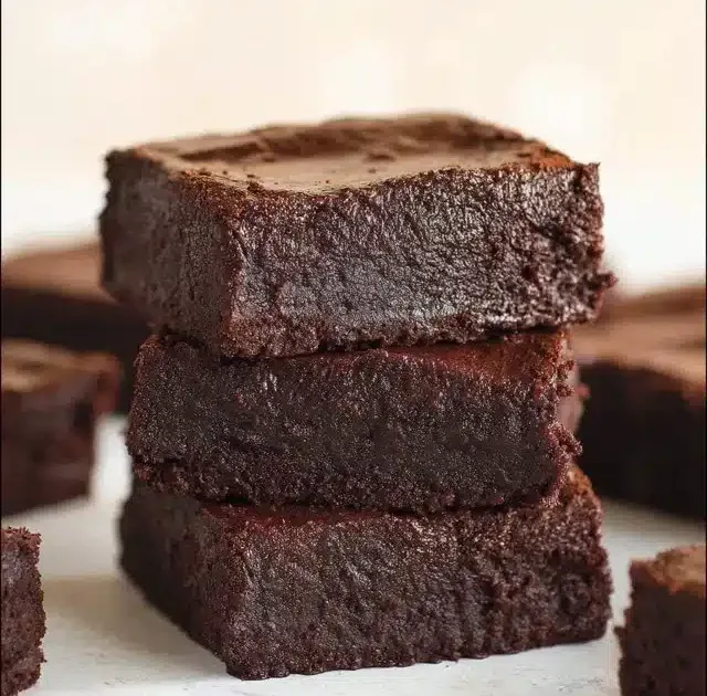 Delicious 4 ingredient cottage cheese brownies on a plate.