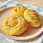 Freshly baked Honey Bun Cookies drizzled with cinnamon glaze