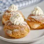 Delicious Peach Puff Ring-a-lings displayed on a plate.