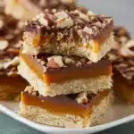 Delicious Salted Caramel Nut Slice with nuts and caramel drizzle