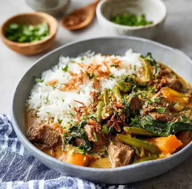 A delicious bowl of slow cooker Thai Green Beef Curry with vegetables