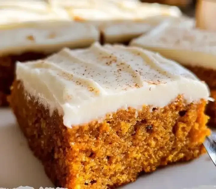 Delicious homemade pumpkin bars topped with cream cheese frosting