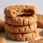 Three ingredient healthier no bake peanut butter cookies on a plate