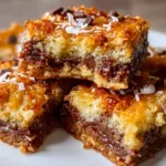 Delicious Millionaire Magic Bars with chocolate, caramel, and nuts