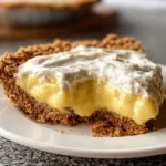No-Bake Sugar Free Lemon Pie with lemon slices and whipped cream topping