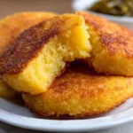 Delicious old-school hot water cornbread served in a rustic bowl
