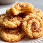 Baking 3-ingredient butter cookies made with butter, sugar, and flour.