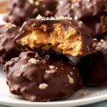 Delicious Peanut Butter Chocolate Clusters arranged on a plate.