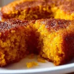 Freshly baked sweet potato cornbread served on a rustic plate