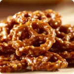 Delicious Church Lady Butter Toffee Pretzels topped with crunchy nuts.