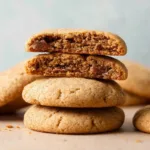 Freshly baked cinnamon sugar cookies on a cooling rack.