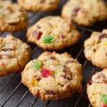 A platter of homemade Fruitcake Cookies decorated with nuts and dried fruit