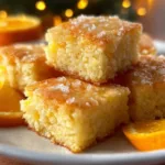 Festive holiday Orange Glow Snack Squares with bright orange colors and a delicious topping
