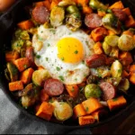 Colorful sweet potato Brussel sprout hash served in a bowl