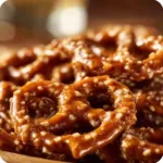 Delicious butter toffee pretzels coated in rich caramel flavor, perfect snack.