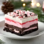 Delicious chocolate peppermint lasagna ready to serve at a festive gathering.