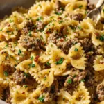 Garlic Butter Bowtie Pasta with Ground Beef served in a bowl