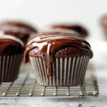 Delicious chocolate ganache draped over a decadent dessert.