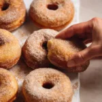Delicious cinnamon sugar donuts topped with sweet cinnamon sugar coating.