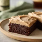 Delicious homemade Guinness brownies topped with creamy frosting
