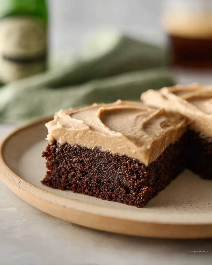 Delicious homemade Guinness brownies topped with creamy frosting