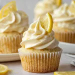 Deliciously moist lemon cupcakes topped with creamy lemon frosting.