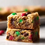 M&M Chocolate Chip Bars with chocolate chips and colorful M&M candies