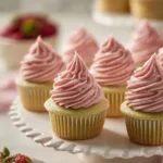 Delicious pistachio strawberry cupcakes with fresh strawberry topping