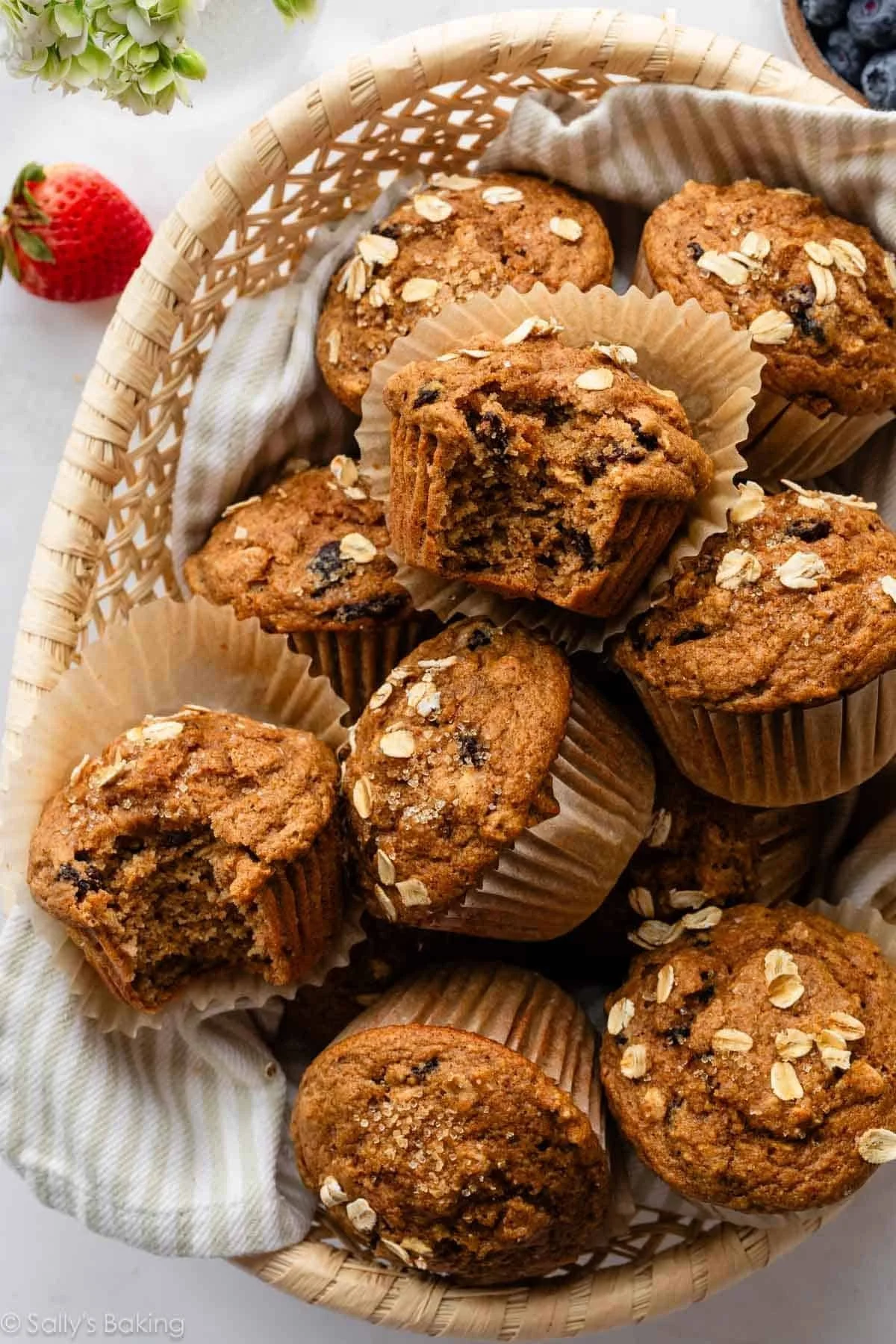 Freshly baked applesauce muffins cooling on a wire rack