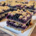 Delicious blueberry crumble bars with a buttery topping fresh from the oven
