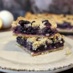 Delicious blueberry crumble bars topped with crunchy crumble layer