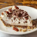 Delicious Chocolate Vanilla Cream Pie with whipped cream topping