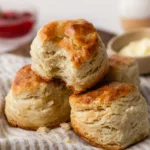 Freshly baked homemade biscuits on a wooden table