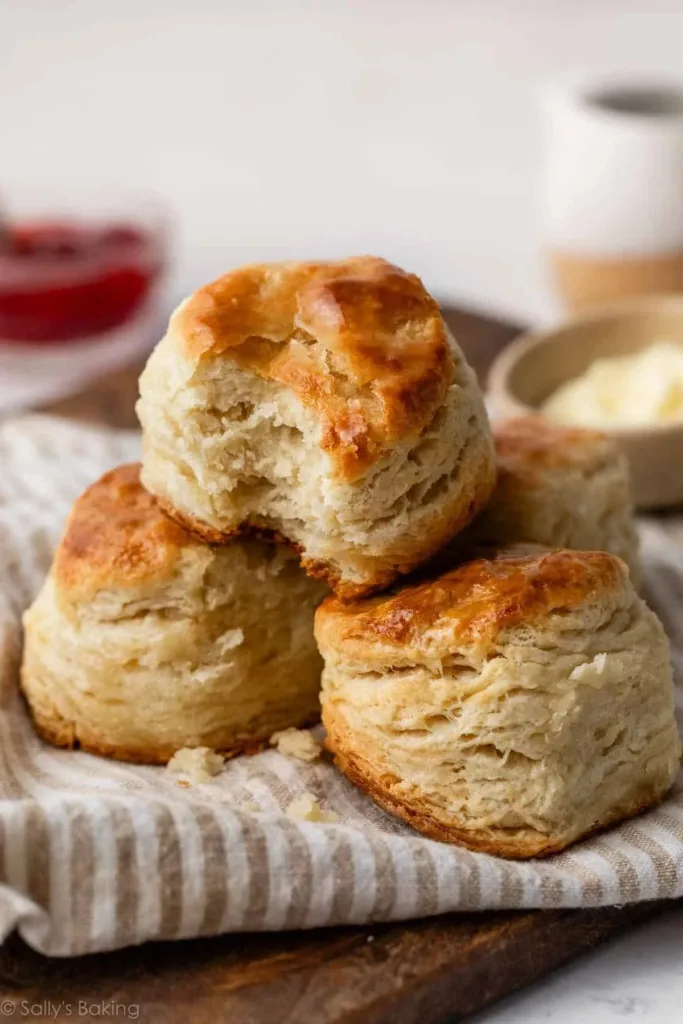 Freshly baked homemade biscuits on a wooden table
