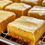 Pumpkin Sheet Cake with Brown Butter Icing on a white plate